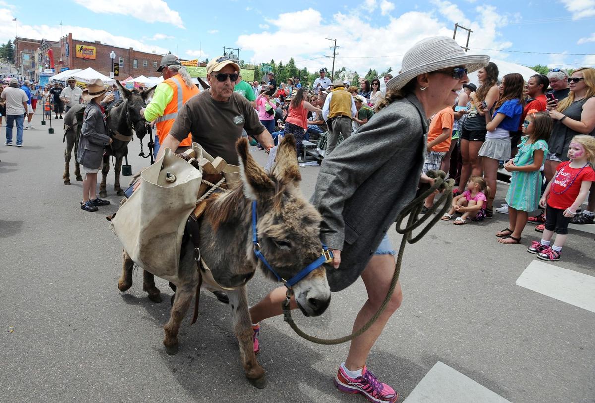 Racers push, pull donkeys at Donkey Derby Days in Cripple Creek