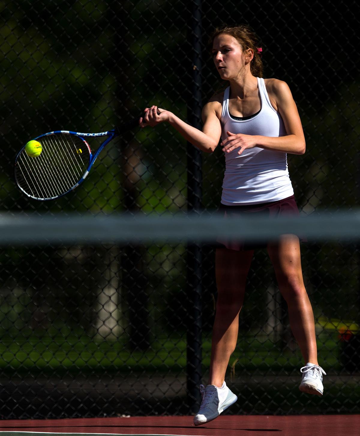 Cheyenne Mountain’s Ally Arenson returns a volley in the No. 1 Doubles finals Saturday, May 13, 2017, at the 4A State Tennis Championships in Pueblo. Arenson and her partner, Casey Ahrendsen won their fourth straight No. 1 Doubles title with a 6-1, 6-2 win over Valor Christian’s Tiffany Parobek and Lucie Hosse. (The Gazette, Christian Murdock)