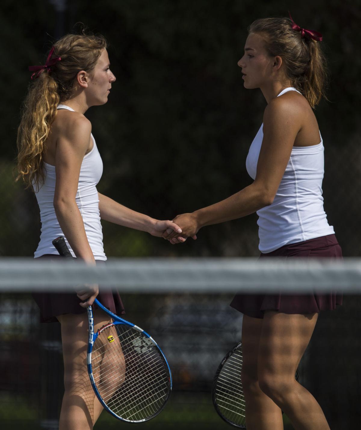Cheyenne Mountain’s Casey Ahrendsen, right, and Ally Arenson celebrate after winning a point during No. 1 Doubles finals Saturday, May 13, 2017, at the 4A State Tennis Championships in Pueblo. The two won their fourth straight No. 1 Doubles title with a 6-1, 6-2 win over Valor Christian’s Tiffany Parobek and Lucie Hosse. (The Gazette, Christian Murdock)