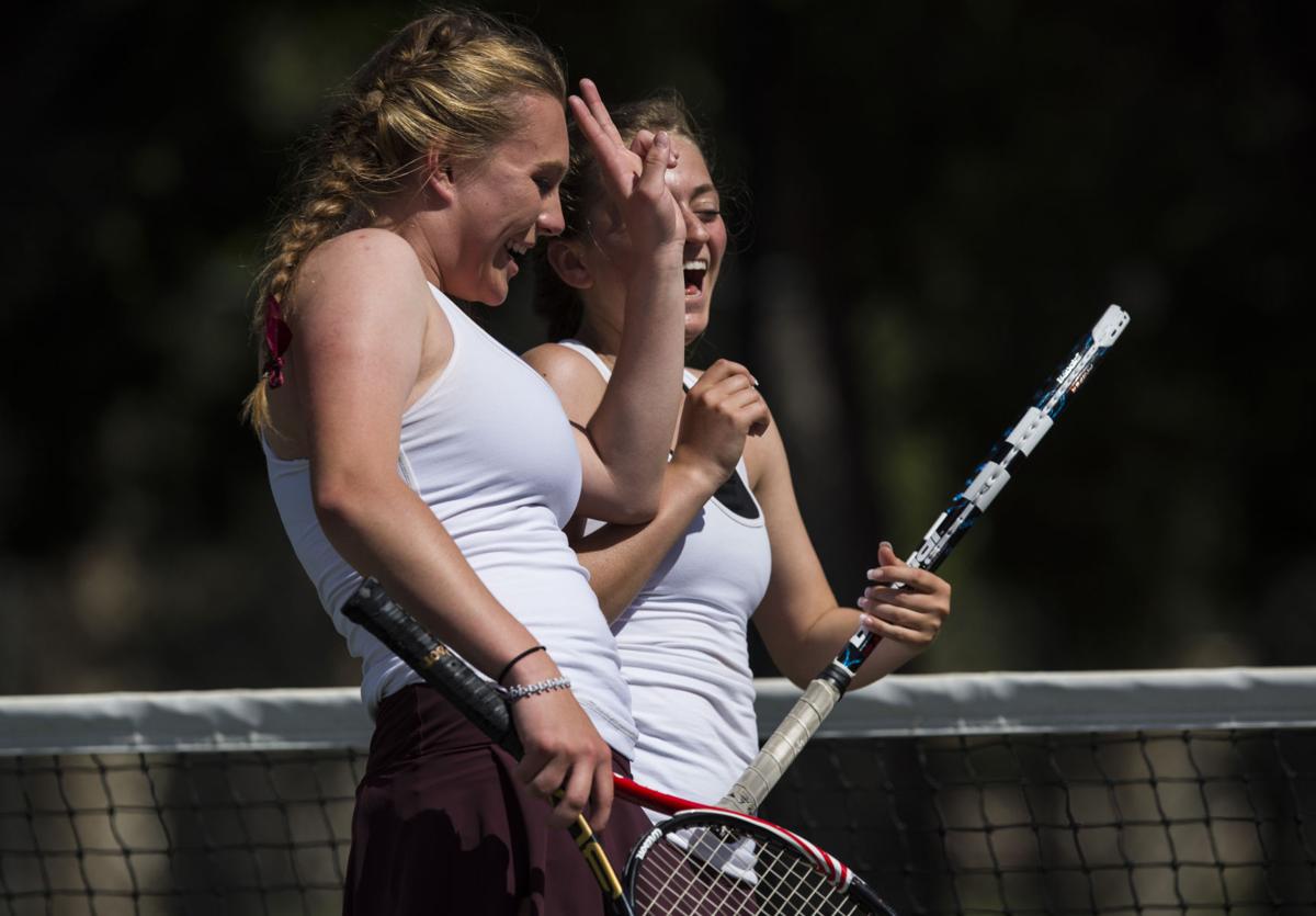 Cheyenne Mountain’s Taylor Heinicke, left, and Arianna Arenson celebrate after winning the No. 2 Doubles finals Saturday, May 13, 2017, at the 4A State Tennis Championships in Pueblo. Cheyenne Mountain’s Arianna Arenson and Taylor Heinicke defeated Palmer Ridge’s Bali Fitzpatrick and Ciara Bobak 6-4, 6-1. (The Gazette, Christian Murdock)