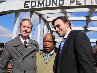 Left to right, artist Nate Powell, Rep. John Lewis, and congressional staffer Andrew Aydin, on the Edmund Pettus bridge. Photo by Sandi Villarreal, courtesy of Top Shelf Productions