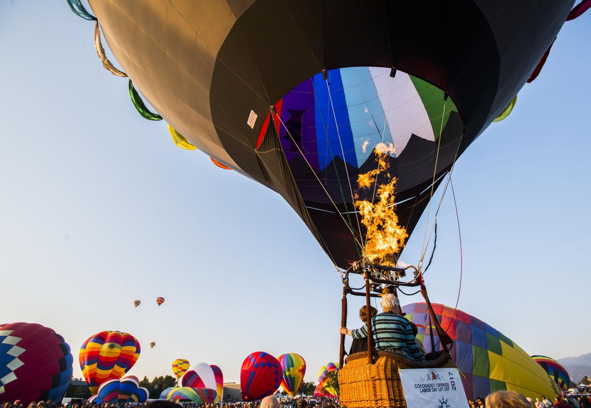 The Incognito balloon lifts off during the first wave Saturday, Sept. 2, 2017, during the Colorado Springs Labor Day Lift Off in Memorial Park. The balloon festival runs through Monday morning. (The Gazette, Christian Murdock)