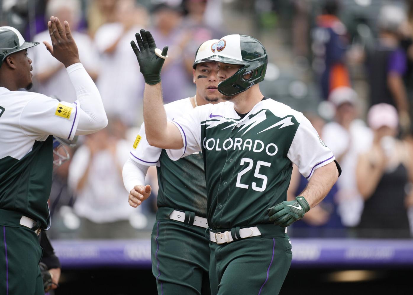 C.J. Cron homers, triples, Rockies beat Rangers in extras