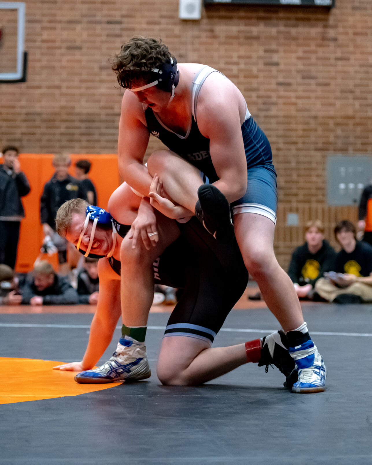 Local Wrestling Teams Dominate Day One of Regional Tournament, Eyeing State Championship