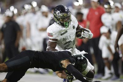 Air Force football arrives in Colorado Springs in two waves Monday