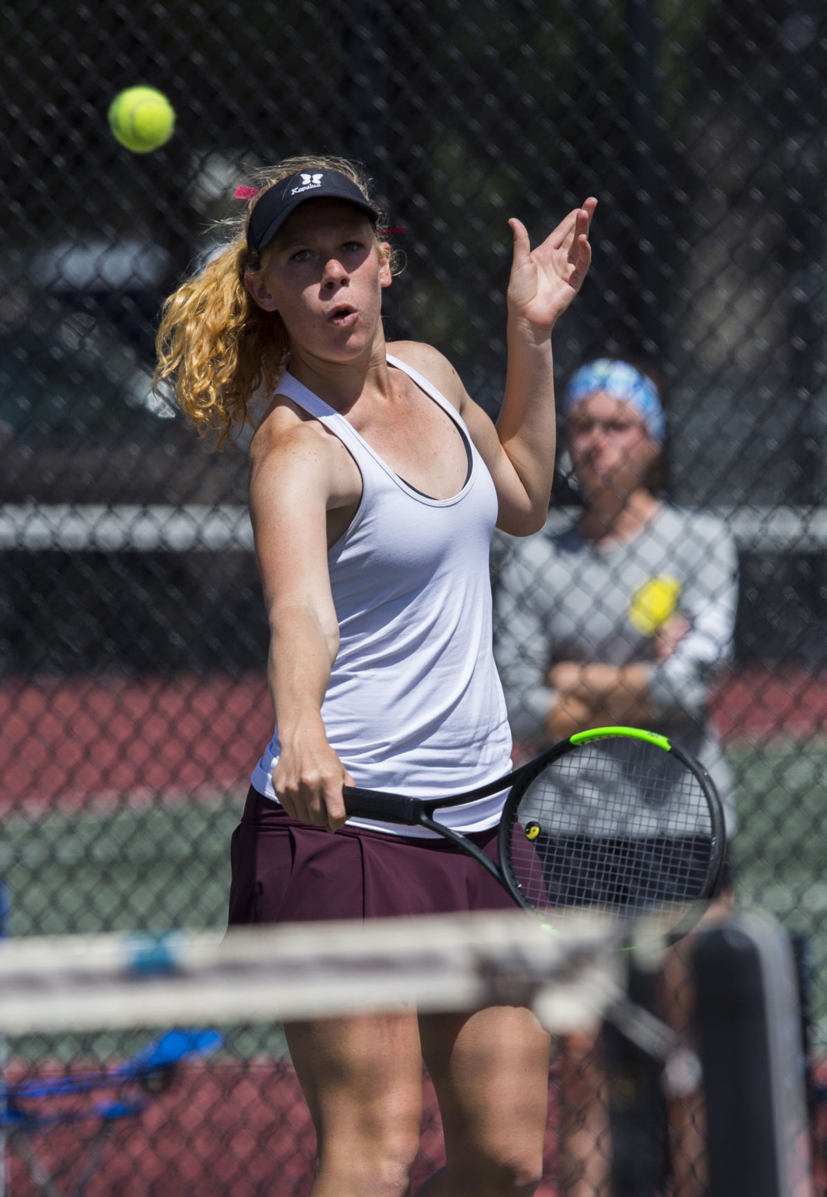 Cheyenne Mountain’s Cory Patton Lossner returns a volley against Kent Denver’s Amanda Schlatter during the No. 2 Singles finals Saturday, May 13, 2017, at the 4A State Tennis Championships in Pueblo. Patton Lossner won 6-2, 6-7, 6-0. (The Gazette, Christian Murdock)
