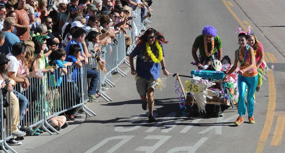 Thousands flocked to Manitou Springs on Saturday, October 25, 2014, for the annual Emma Crawford Coffin Races. The races started in 1995, but the story of Emma Crawford goes back to 1891 when she was buried at the top of Red Mountain above Manitou Sprin...