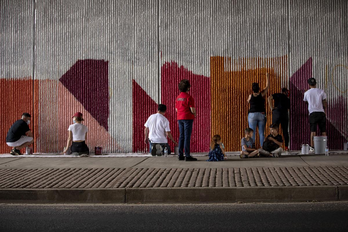 Community helps with the Conejos Mural Project