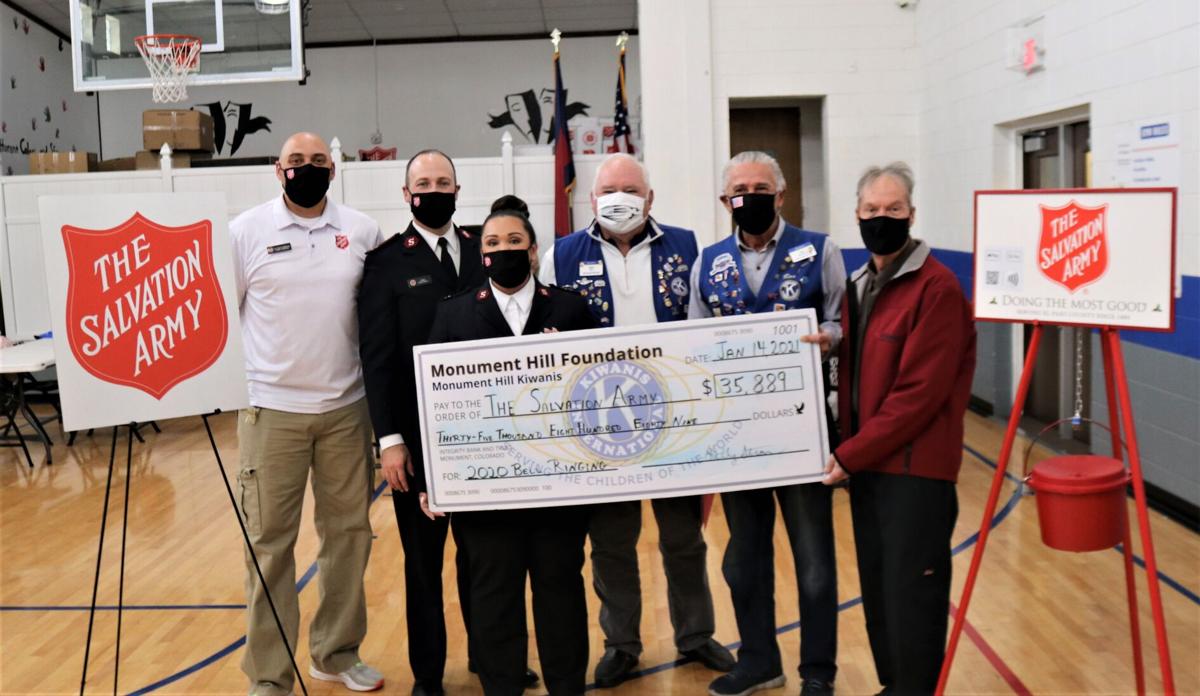 Delivering a big check to The Salvation Army