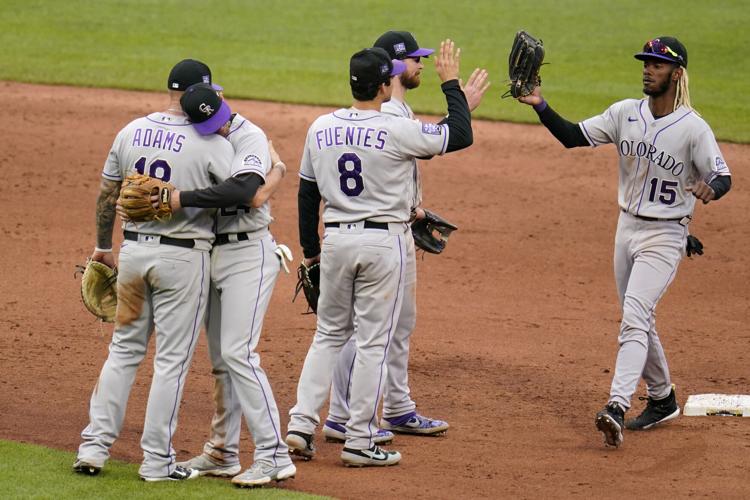 Rockies' Ryan McMahon, once a 'terrible' defender, now a Gold Glove  candidate, Sports