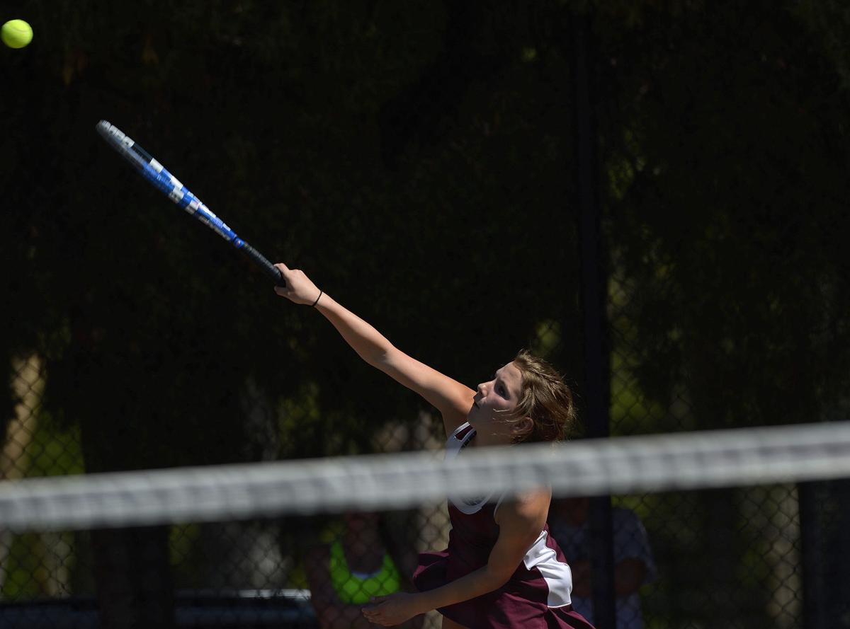 Cheyenne Mountain's Ally Arenson serves against Niwot during the No. 1 doubles finals Saturday, May 10, 2014, at the Colorado 4A girls state tennis championships finals at City Park in Pueblo. Arenson and her partner Casey Ahrendsen defeated Niwot's Lauren Richards and Maura Derr 6-4, 6-3 for the state title. (The Gazette, Christian Murdock)