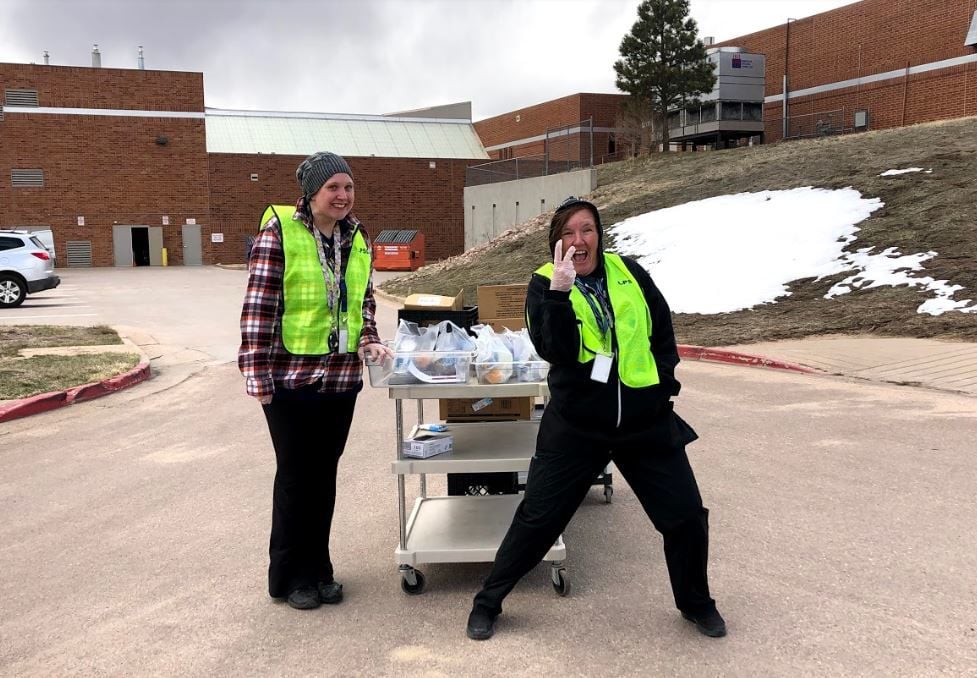 D-38 staff supports community need through meal distribution