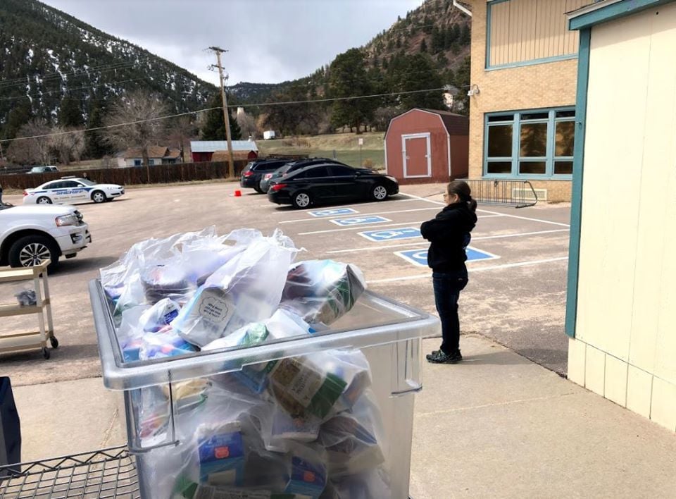 D-38 staff supports community need through meal distribution