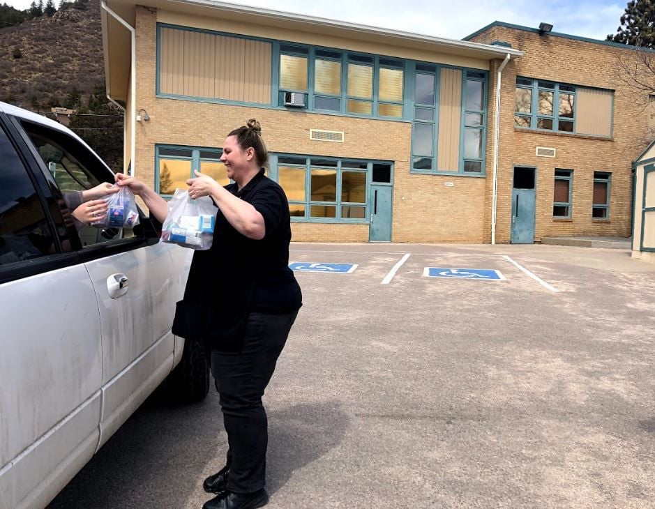 D-38 staff supports community need through meal distribution