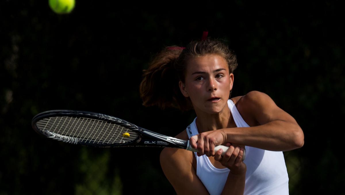 Cheyenne Mountain’s Casey Ahrendsen returns a volley in the No. 1 Doubles finals Saturday, May 13, 2017, at the 4A State Tennis Championships in Pueblo. Ahrendsen and her partner, Ally Arenson won their fourth straight No. 1 Doubles title with a 6-1, 6-2 win over Valor Christian’s Tiffany Parobek and Lucie Hosse. (The Gazette, Christian Murdock)