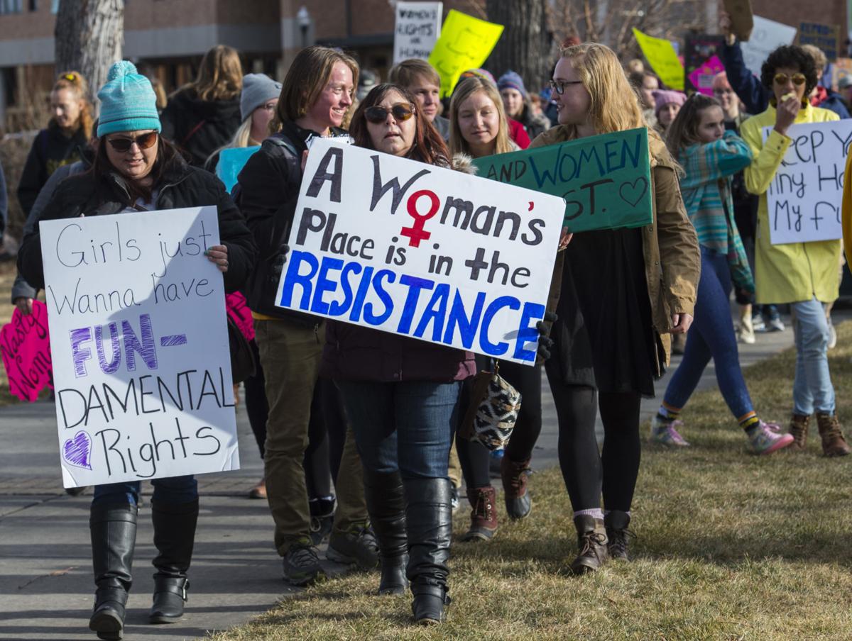 Protesters march back to Acacia Park Saturday, Jan. 21, 2017, during the Colorado Springs Women's March in downtown Colorado Springs. The sister march of the Women's March on Washington, D.C., drew between 5,000 and 10,000 people. (The Gazette, Christian Murdock)