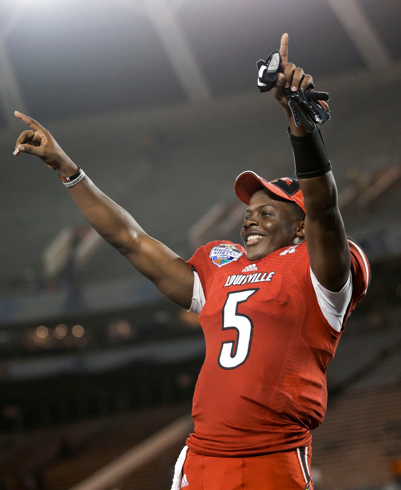 'It's heartwarming', Lamar Jackson's jersey retired by University of  Louisville football