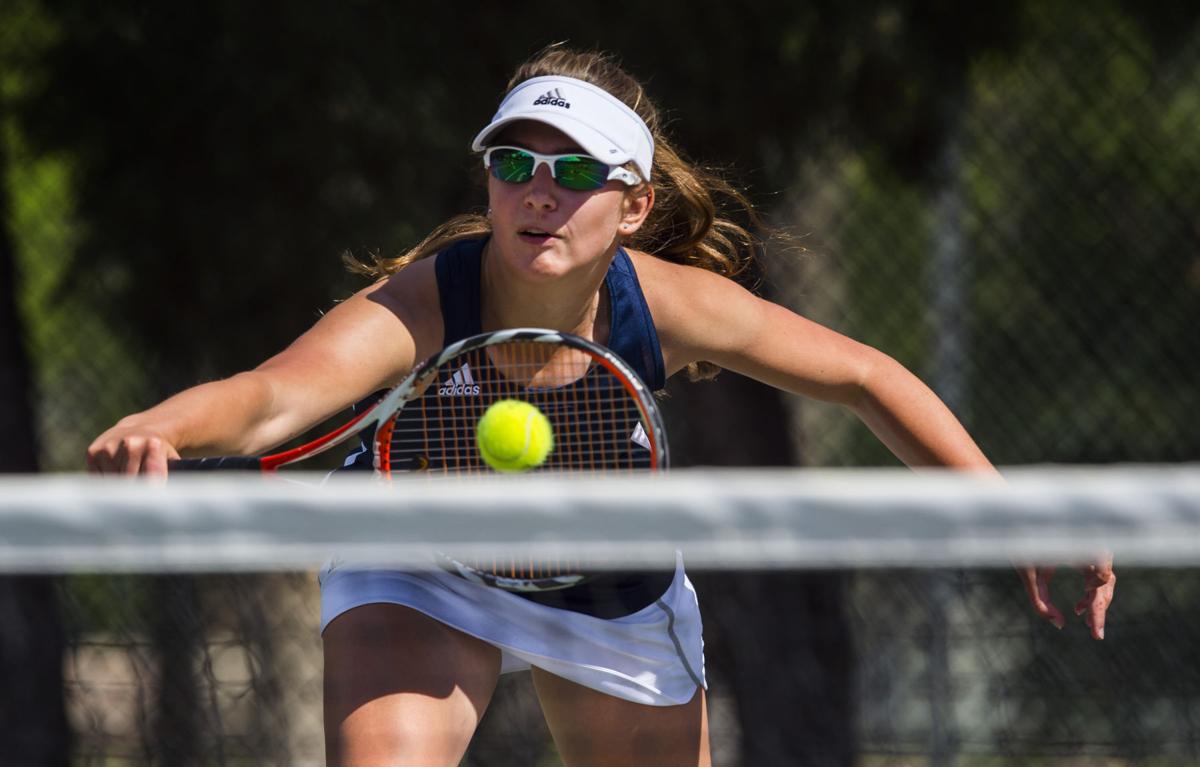 Palmer Ridge’s Bali Fitzpatrick returns a volley during the No. 2 Doubles finals Saturday, May 13, 2017, at the 4A State Tennis Championships in Pueblo. Cheyenne Mountain’s Arianna Arenson and Taylor Heinicke defeated Palmer Ridge’s Bali Fitzpatrick and Ciara Bobak 6-4, 6-1. (The Gazette, Christian Murdock)