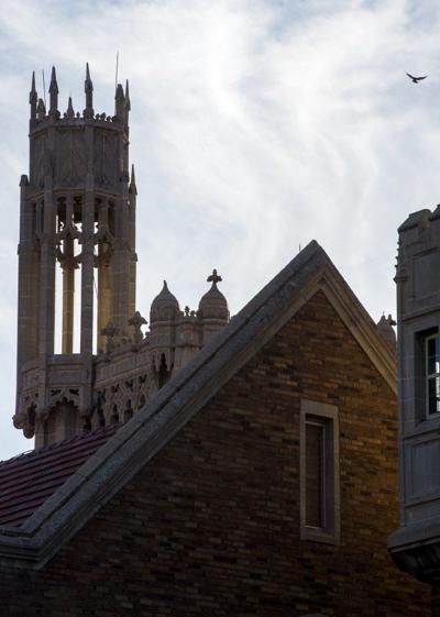 A bird flies over the crenelations on The Holy Cross Abbey in Canon City in this Feb. 1, 2018, photograph. The abbey has had an illustrious history as a Benedictine abbey, then a Catholic boarding school, a winery and now an events center.