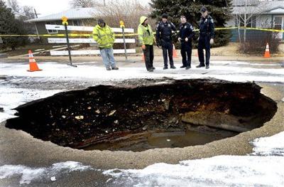 15 Foot Deep Sinkhole In Colorado Nearly Swallows Suv Whole