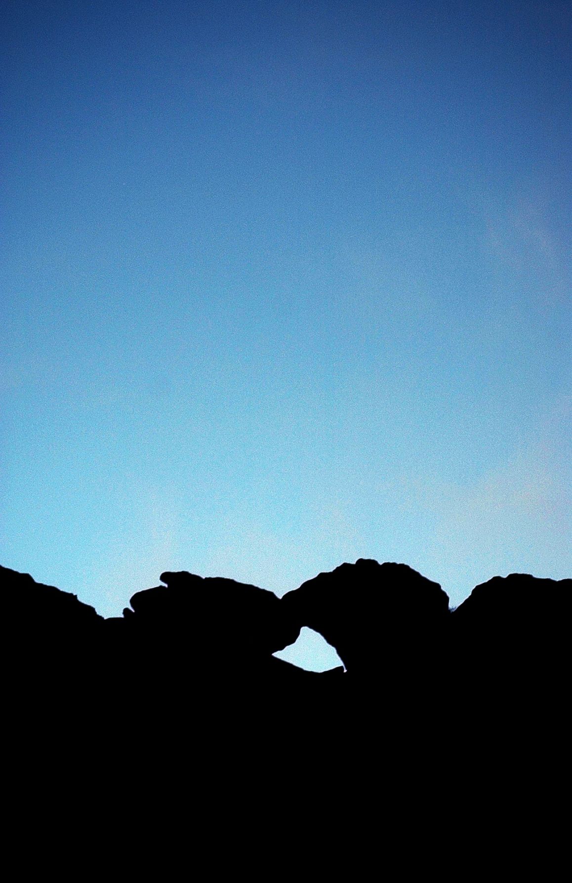 The kissing camels at Garden of the Gods await the sun rise and approximately 150 people to gather for the unofficial 84th annual Easter Sunrise Service at Garden of the Gods on Sunday, April 20, 2003. Approximately 150 people gather for the unofficial 84th annual Easter Sunrise Service at Garden of the Gods on Sunday, April 20, 2003. The service was officially canceled this year due to the cost of putting the event on. Most of the people who showed up this year were members of New Life Church. They gathered to worship through song and prayer. Photo by David Bitton