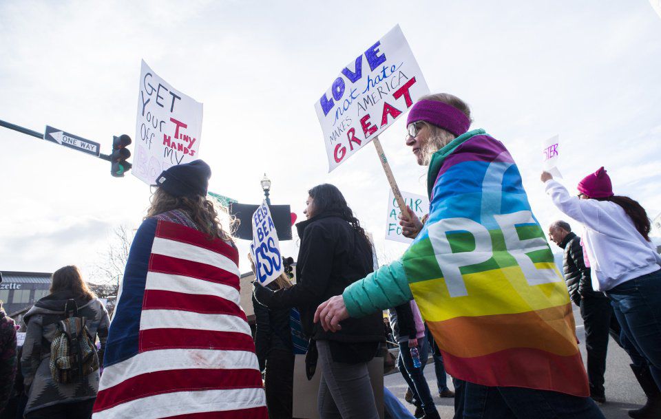 Protesters march down Tejon Street Saturday, Jan. 21, 2017, during the Colorado Springs Women's March in downtown Colorado Springs. The sister march of the Women's March on Washington, D.C., drew between 5,000 and 10,000 people. (The Gazette, Christian Murdock)