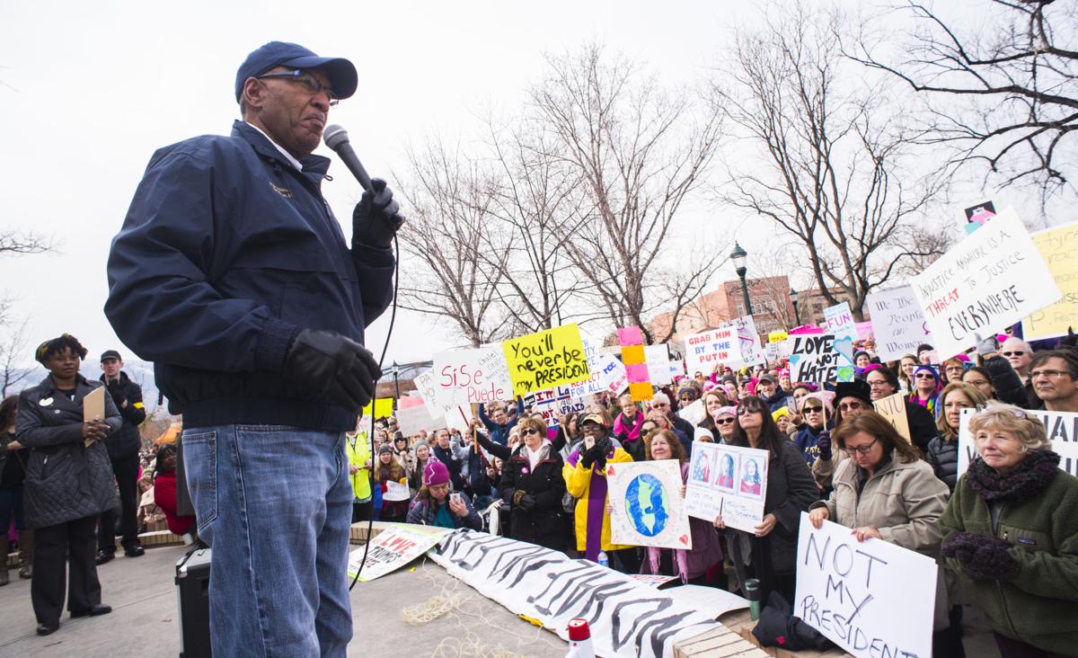 State Rep. Tony Exum, D-Colorado Springs, speaks to the crowd gathered at Acacia Park Saturday, Jan. 21, 2017, during the Colorado Springs Women's March in downtown Colorado Springs. The sister march of the Women's March on Washington, D.C., drew between 5,000 and 10,000 people. (The Gazette, Christian Murdock)