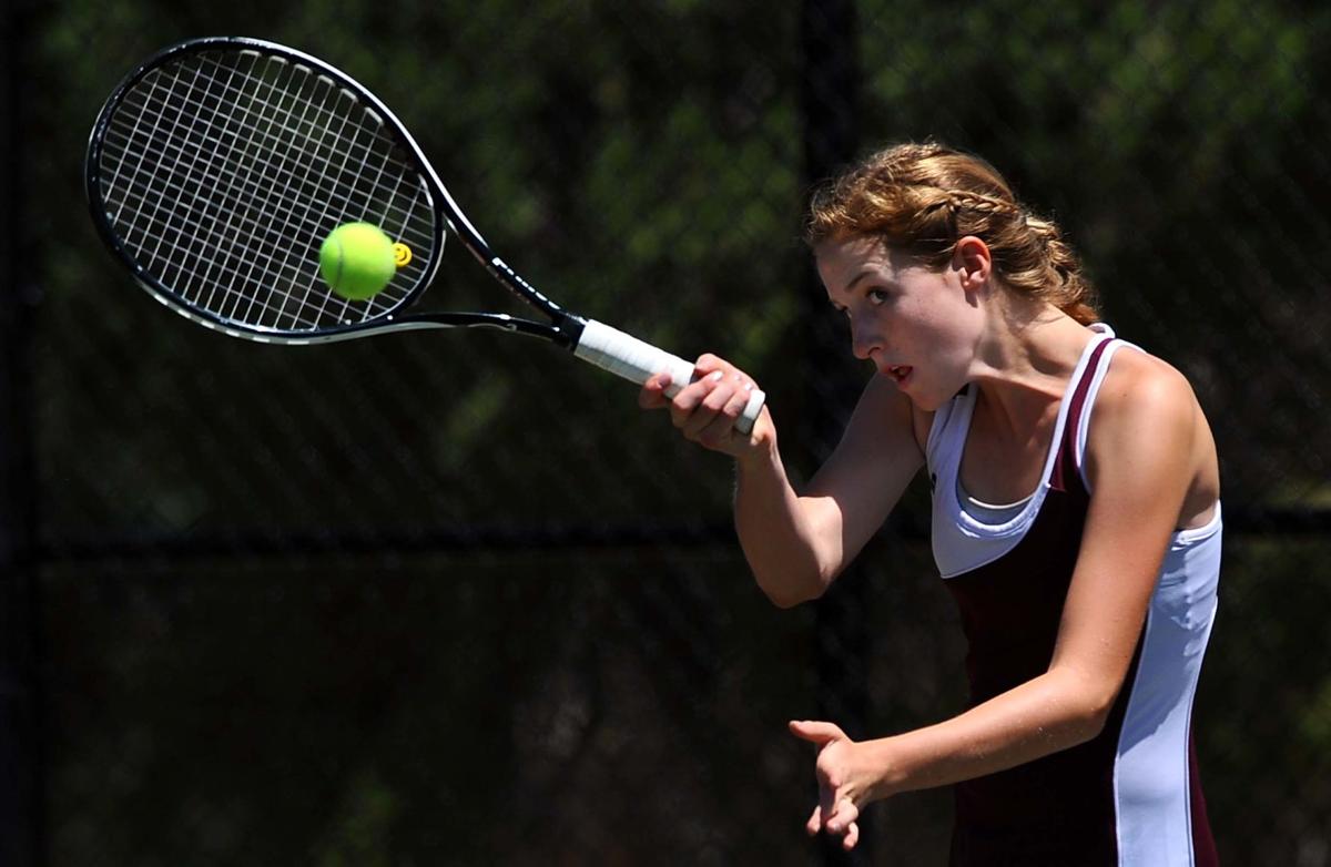 Cheyenne Mountain's Frances Adams returns a volley during the No.1 doubles match between Peak to Peak's Brittany Guidetti and Jenny Seo and Adams and her partner Caroline Kingo Thursday, May 10, 2012, during the first round of the Stage 4A Girls' Tennis Championships at Pueblo City Park. The Cheyenne Mountain team won 6-2,6-1. (The Gazette, Christian Murdock)