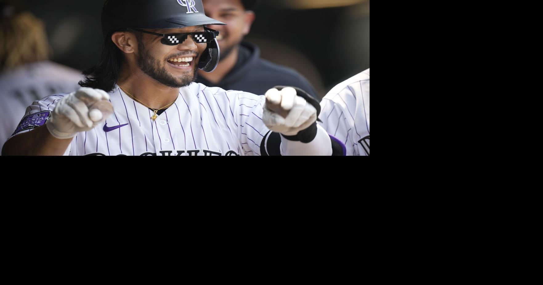 Homer shades get plenty of wear as the Rockies' take down the Cubs