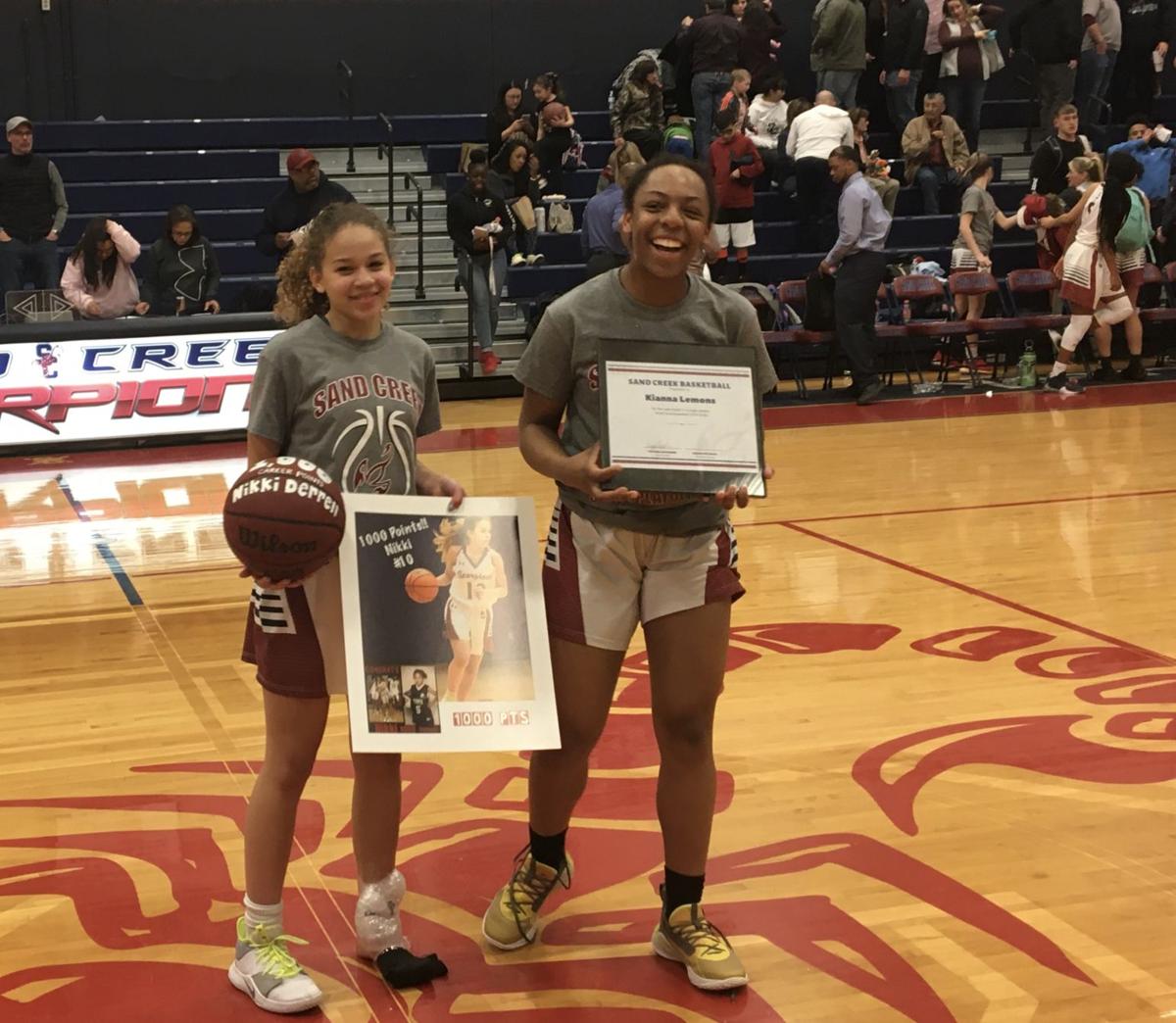 Sand Creek Juniors Nikki Derrell Kianna Lemons Celebrate