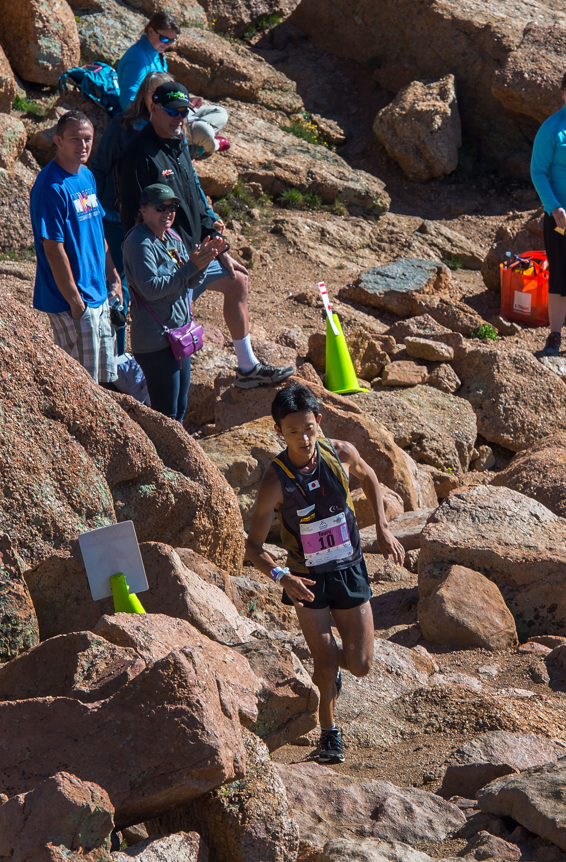 Touru Miyahara of Japan races toward the finish to win the 2015 Pikes Peak Ascent Saturday, Aug. 15, 2015, on the top of 14,115-foot Pikes Peak. The 13.2-mile race begins in Manitou Springs and follows Barr Trail to the top of the mountain. (The Gazette, Christian Murdock)