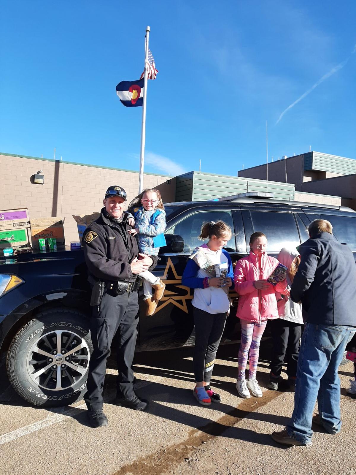 Girl Scout cookies delivered to law enforcement, first responders across Teller County
