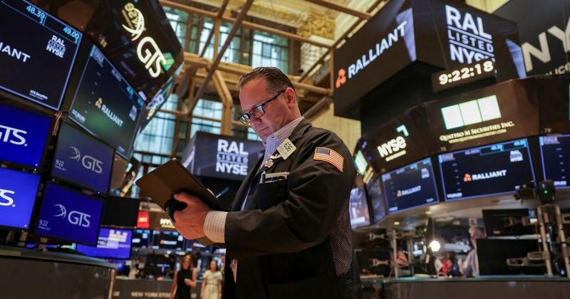 Wall Street falls as tariff uncertainty weighs; Tesla drops on Musk's political ambition