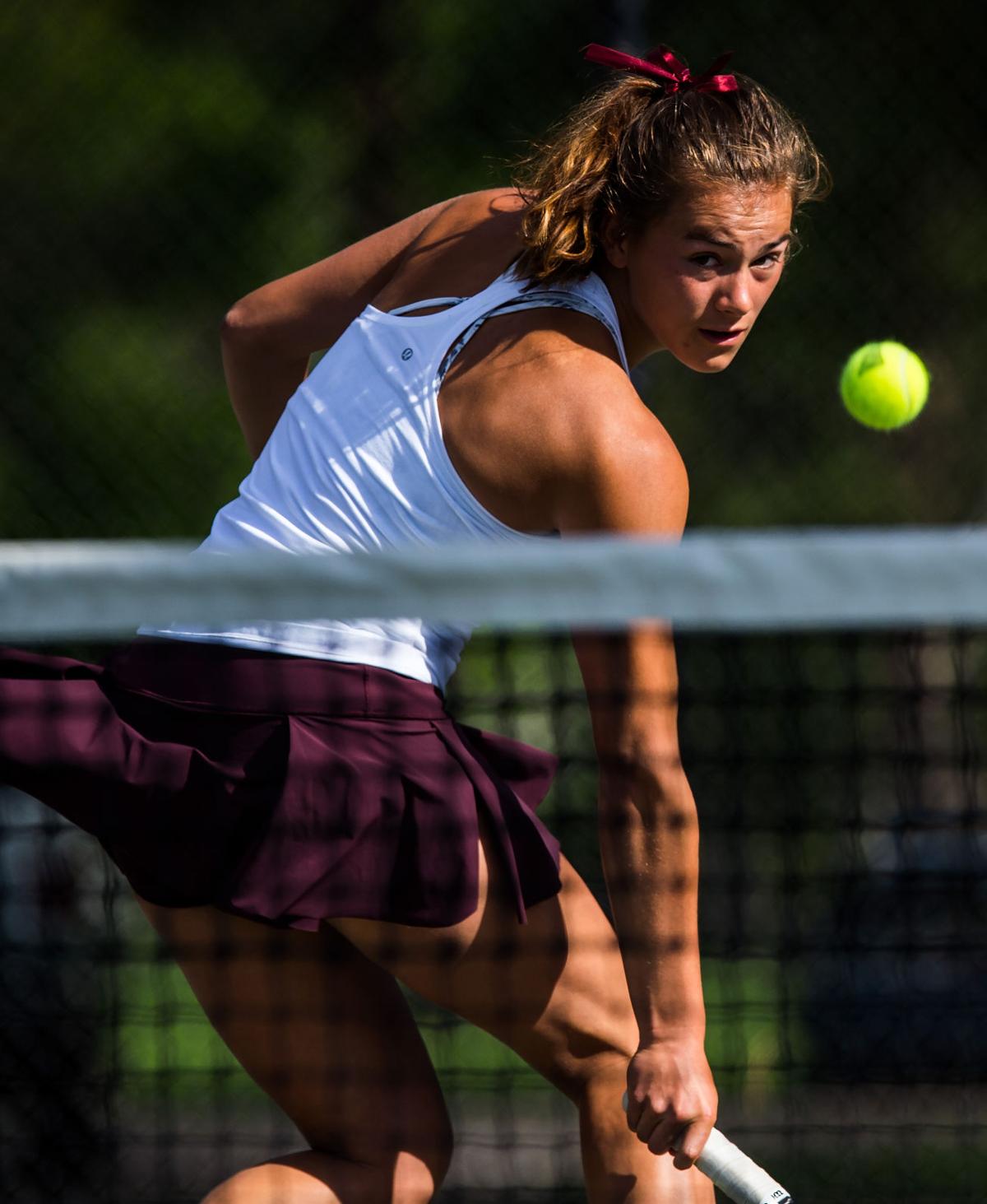 Cheyenne Mountain’s Casey Ahrendsen returns a volley in the No. 1 Doubles finals Saturday, May 13, 2017, at the 4A State Tennis Championships in Pueblo. Ahrendsen and her partner, Ally Arenson won their fourth straight No. 1 Doubles title with a 6-1, 6-2 win over Valor Christian’s Tiffany Parobek and Lucie Hosse. (The Gazette, Christian Murdock)