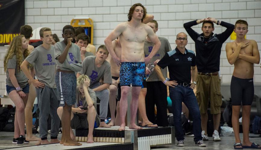 The Discovery Canyon team can only watch from the sidelines during the final event, the boys 400-yard freestyle relay, after their team was disqualified for a clothing infraction Saturday, May 19, 2018, during the Class 4A Colorado State Swimming Champi...