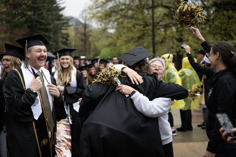 High School Student Graduates, As Her Hero Cheers Her on