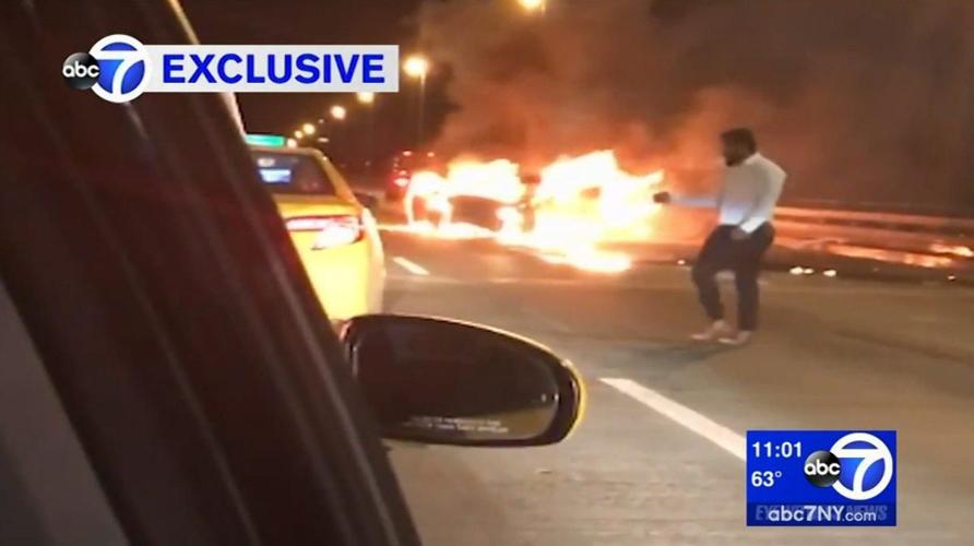 WATCH: A man hailed a cab to flee a burning car — leaving a woman to die in the fiery wreck, police say