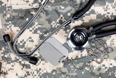 Military medical concept with stethoscope and identification tag