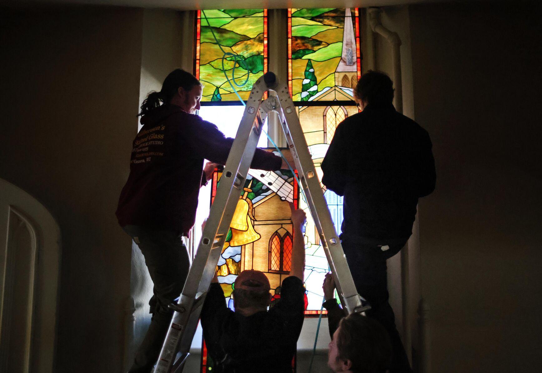Window on creation On Easter Sunday, downtown Janesville church