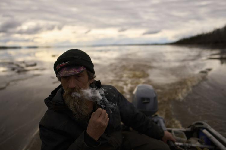 APTOPIX Climate Alaska Log Retrieval Photo Essay