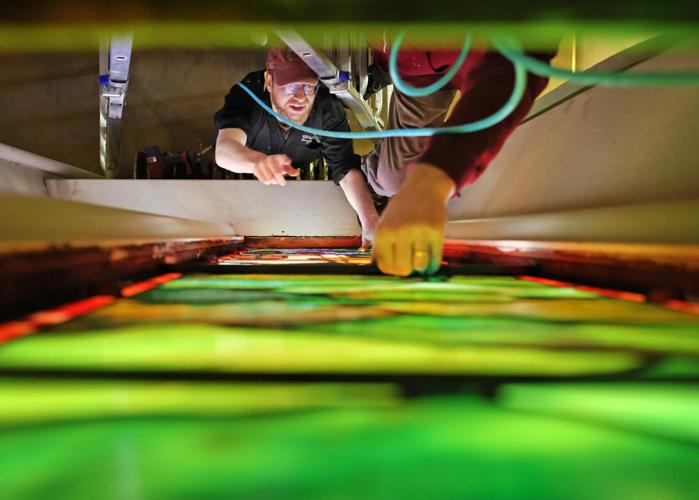 Window on creation On Easter Sunday, downtown Janesville church