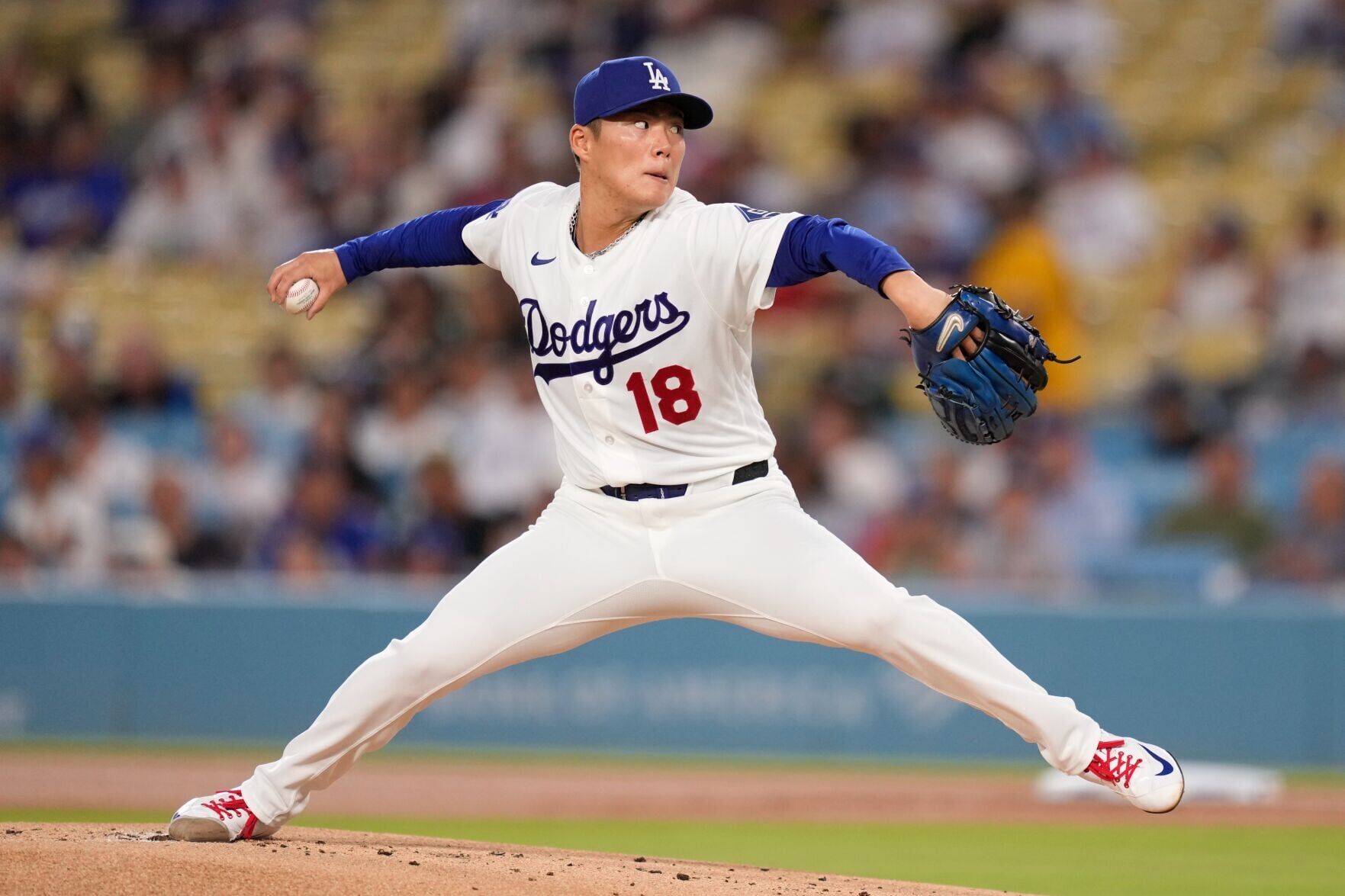 Yamamoto strikes out 10 as the Dodgers rout the Reds 14-1 for 7th