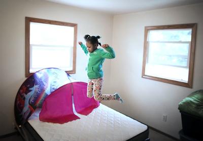 Gift Of New Bed Comforts Family Who Came To Janesville To Escape