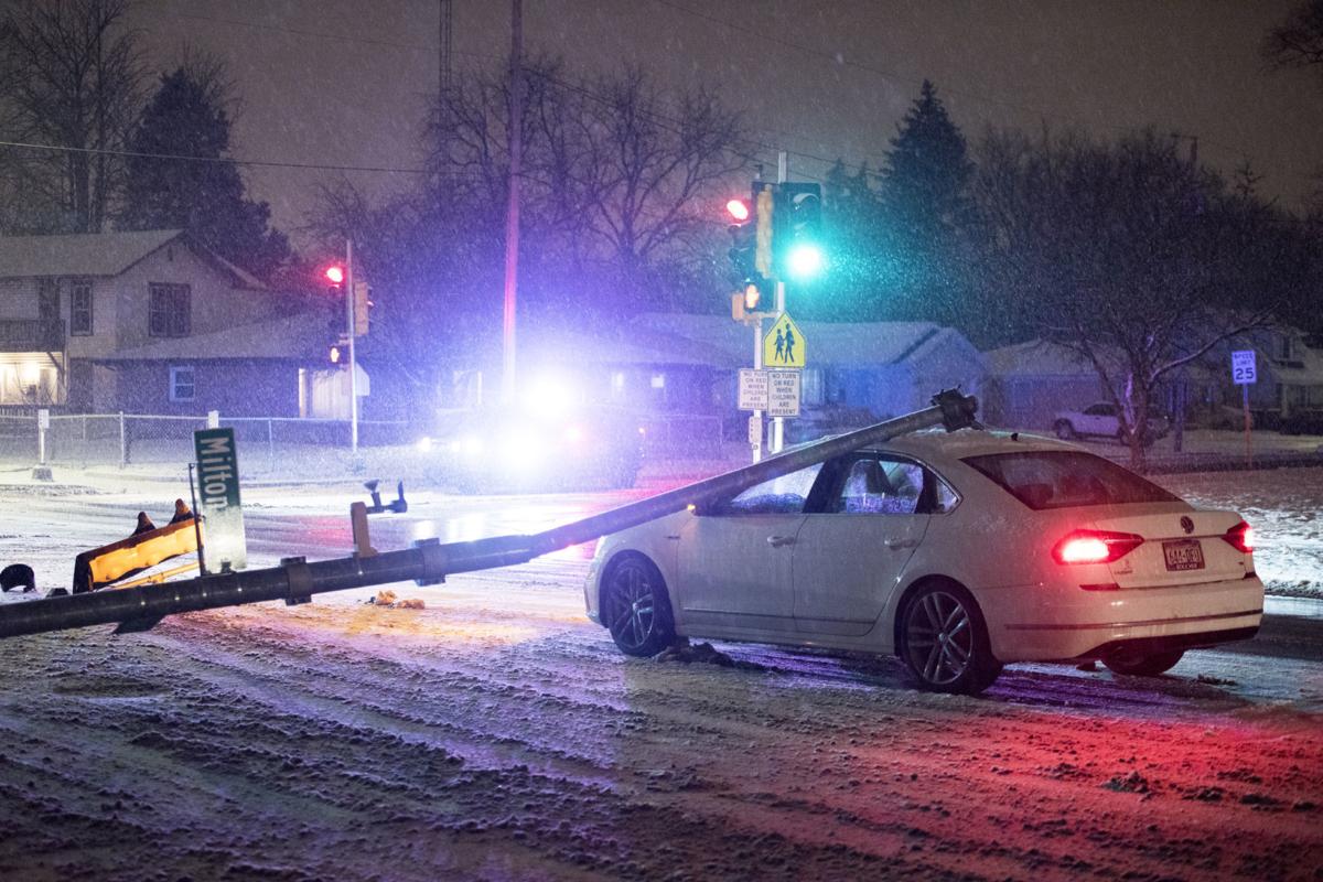 Police Accident on Milton Avenue causes traffic light to fall on car