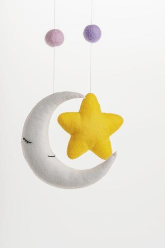 Colorful And Eco-friendly Children’s Mobile From Felt. On White Background.