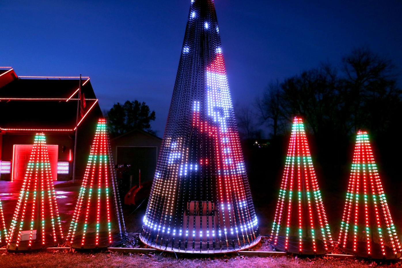 Locals spread Christmas joy with unusual light displays Local News