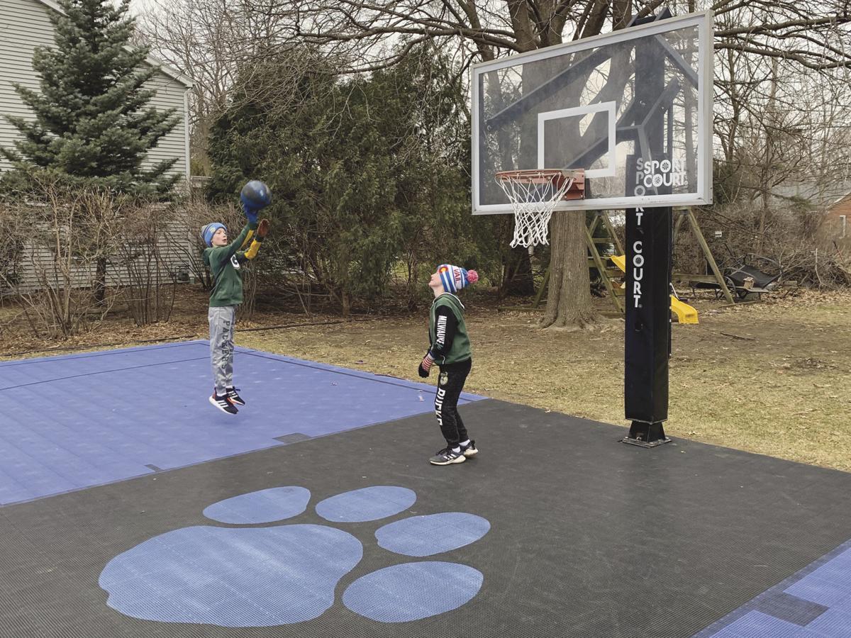 Backyard Court Serving As Neighborhood Gathering Spot For Second