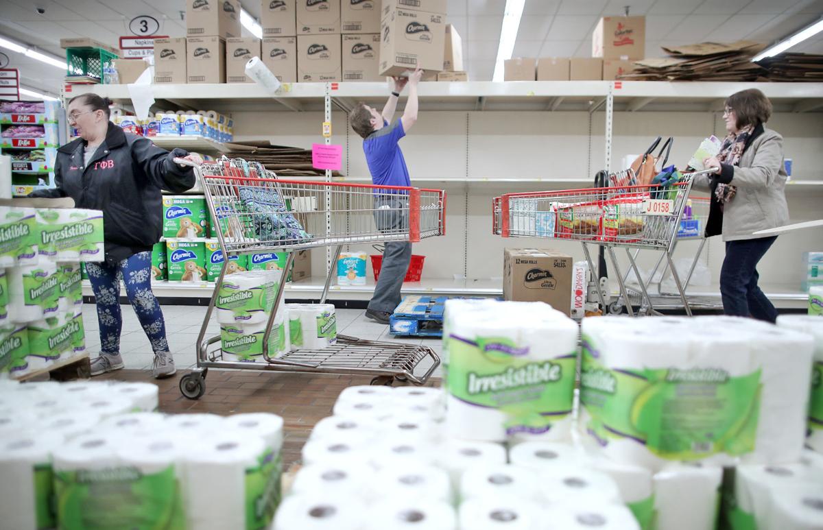 Woodman's rations toilet paper, water in face of shopping crush Coronavirus