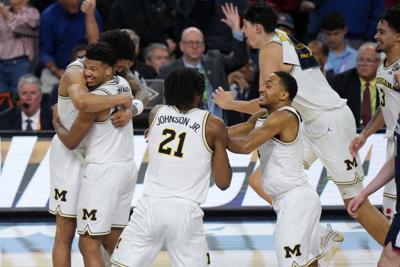 NCAA UConn Michigan Basketball