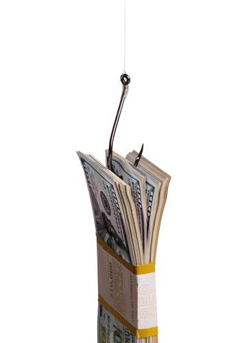 A Large Bundle Of Hundred-dollar Bills In Bank Packaging Suspended On A Fishing Hook As A Bait On A
